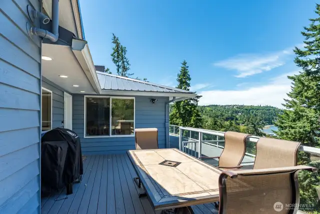 Another area of the deck big enough to have a large outdoor dining table.