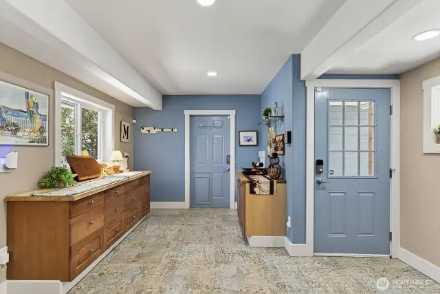 This is their pantry or mud room.  Come in from the garage toward the kitchen. Also a side door to the patio out front.