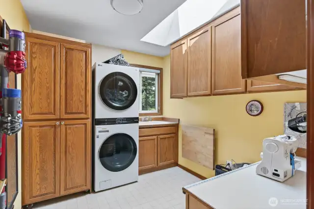 Laundry is on the main level with a built in sewing desk.