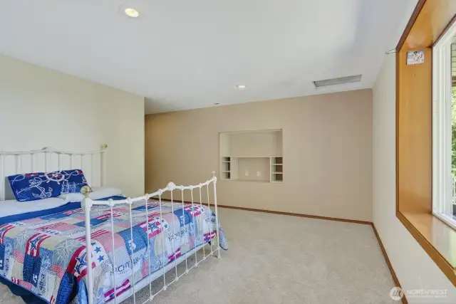 Guest Bedroom down that had a 3/4 bath and walk in closet.