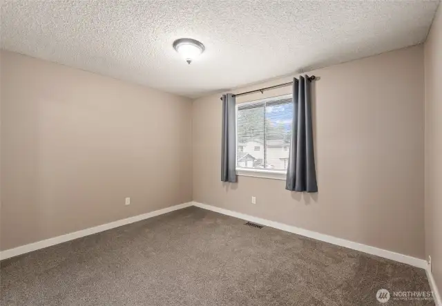 large downstairs bedroom with large closet
