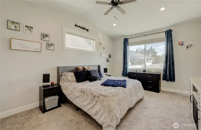 Private primary bedroom suite just steps from the main living space.