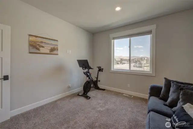 Additional angle showcasing the first bedroom.
