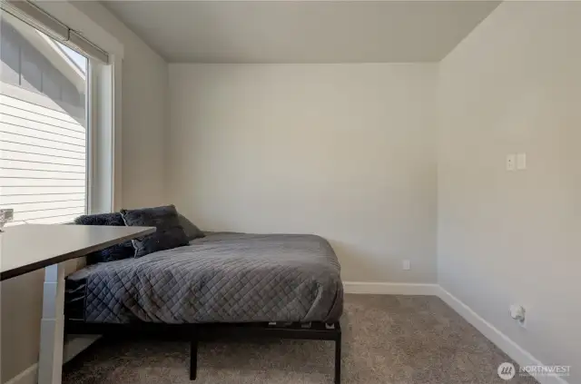 Additional angle showcasing the second bedroom.