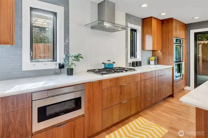 CUSTOM CABINETS MADE BY SMITH & VALLEE IN BOW EDISON, WA  There is a cabinet that has a custom pull-out for a stand mixer.