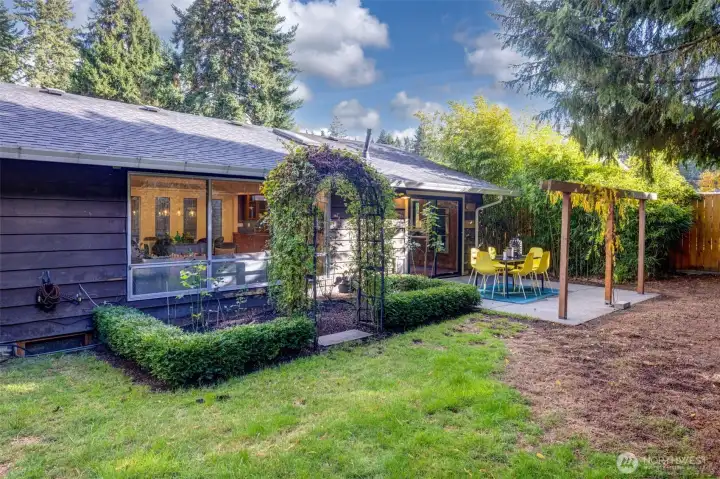 The patio off the kitchen is the perfect place to dine al fresco all summer long. Throughout the year there are plants and bulbs that bloom and create an oasis.  The garden has been prepared for winter and is in quiet mode, but will be back in the Spring to show its true colors.