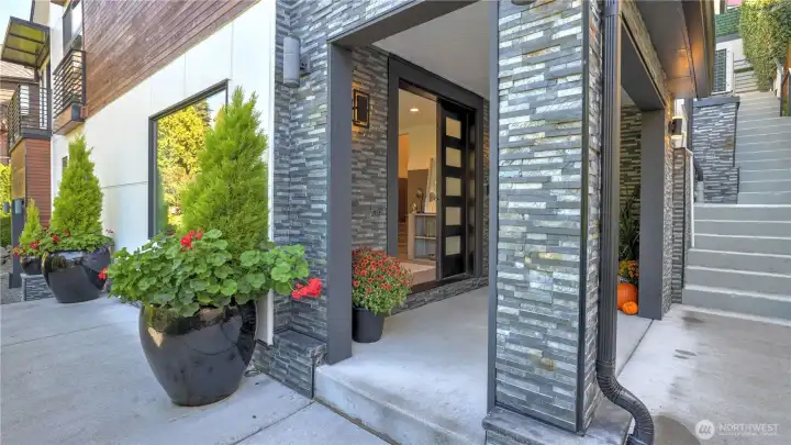 Modern stone entry with clean architectural lines.