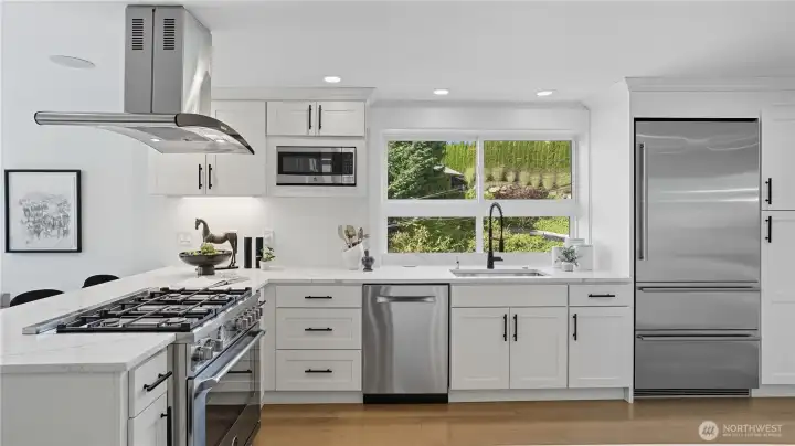 This kitchen invites you to indulge your culinary creativity. Stainless steel appliances complement this kitchen and expansive counter space is ideal for meal prep.