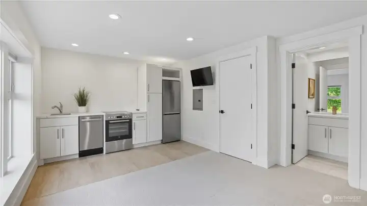 Guest suite with kitchenette and attached 3/4 bath.