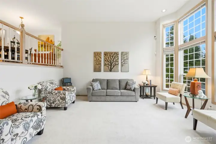 Formal living rm w/ floor-to-ceiling windows