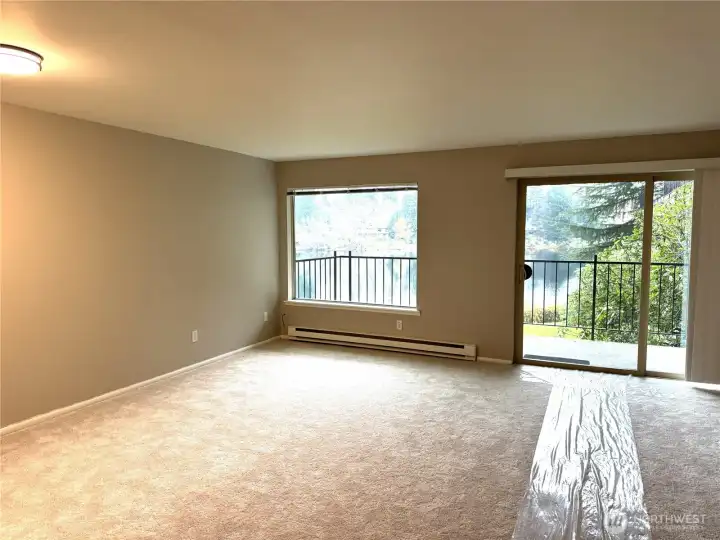 Beautiful lake view from entire living room & dining room area. Beautiful lake view from entire living room & dining room area.