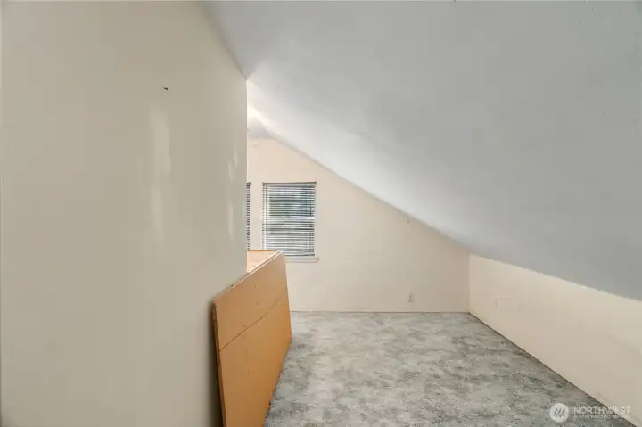finished attic space, perfect for home office or storage.