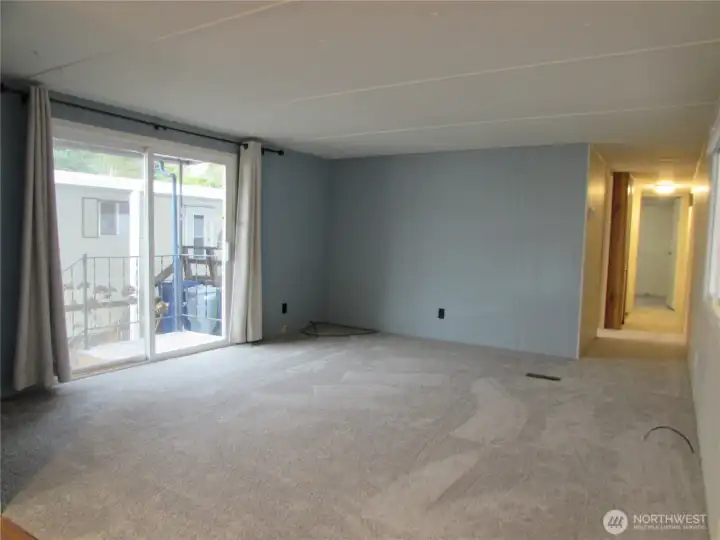 FRONT DOOR INSIDE THE LIVING ROOM