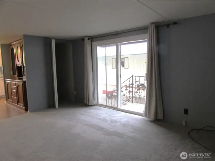 EXTRA STORAGE OFF SLIDER IN LIVING ROOM