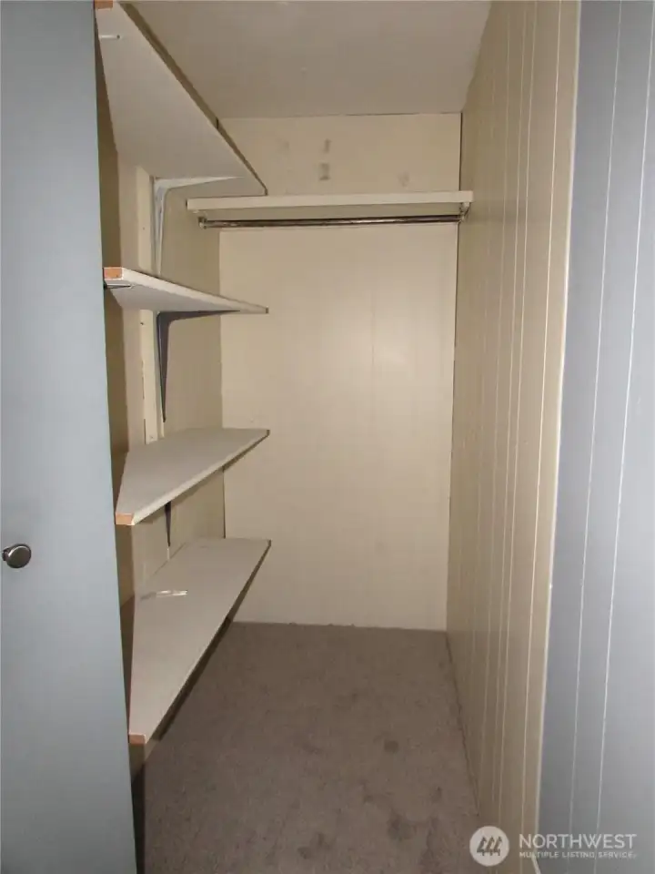 BUILT IN SHELFS IN EXTRA STORAGE OFF SLIDER IN LIVING ROOM