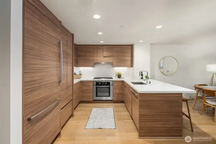 Stylish designer kitchen with Boche appliances.