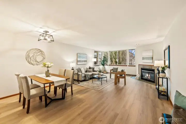 Brand new LVP floors and fresh paint sparkle in abundant natural light.