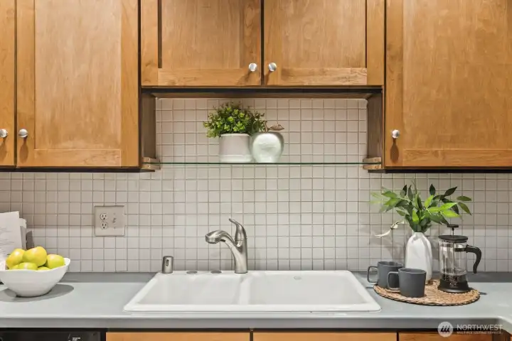 This sweet shelving nook is perfect for plants or knick knacks.