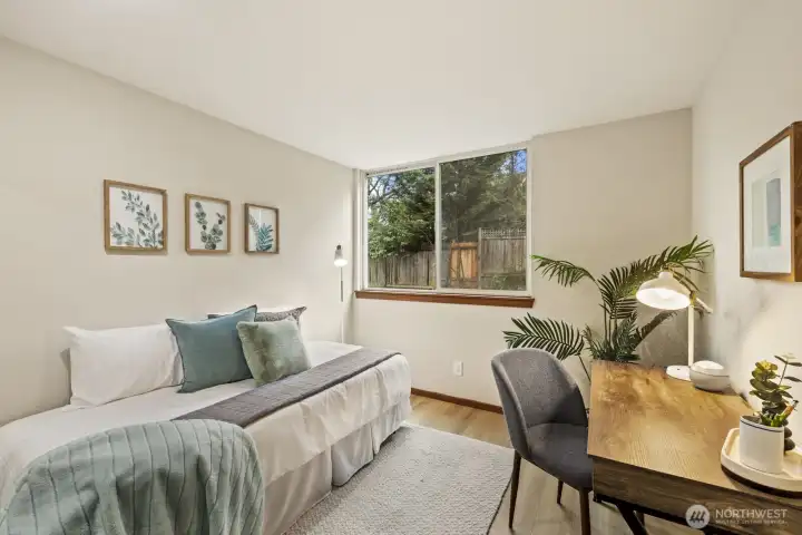 This lower level bedroom works great as a home office, or to give guests their own private space.