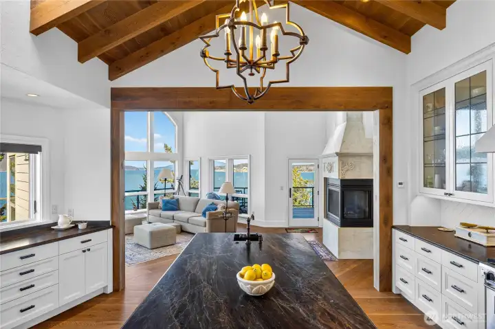 From the kitchen, the space flows into the family room where wide windows frame incredible water and island views.  Orcas, seals and sea otters can often be seen playing in the water.