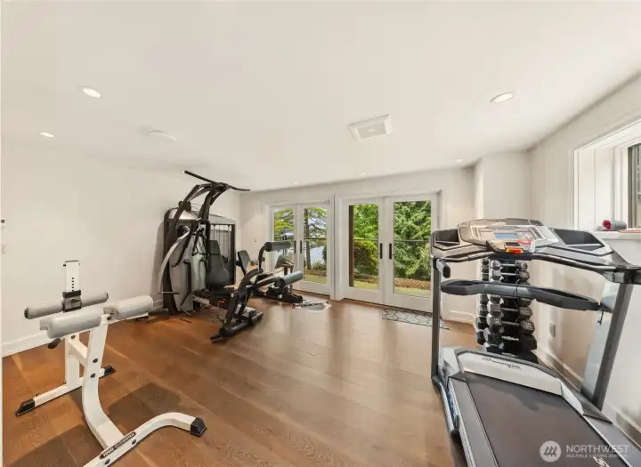 The wellness suite includes a full Precor gym, Nautilus treadmill, and both dry and wet sauna for health and relaxation.  The large hot tub is on the view patio.