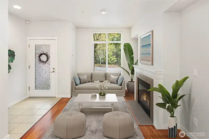 Cozy gas fireplace in living room at main.
