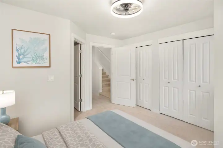 Master Bedroom with dual closets at upper level