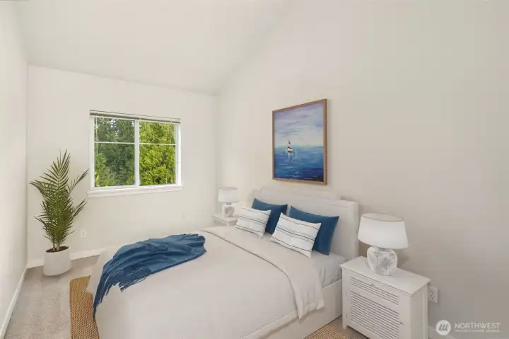 3rd bedroom with vaulted ceiling and large walk-in-closet right off crown level loft.