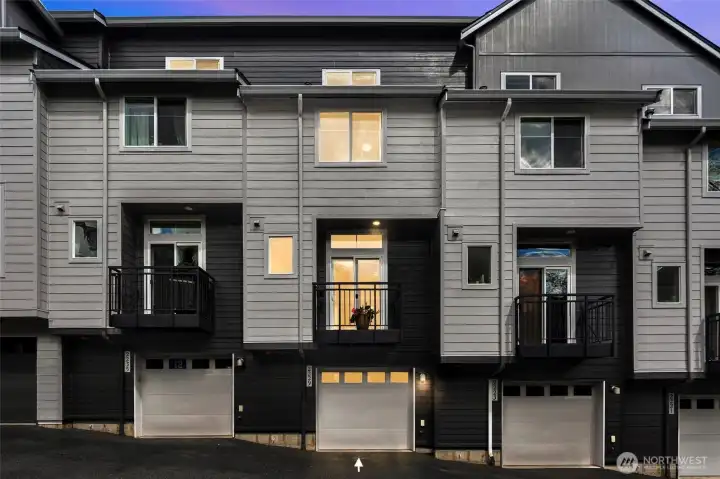 2-car garage with ample storage at lower level with entry on street level.