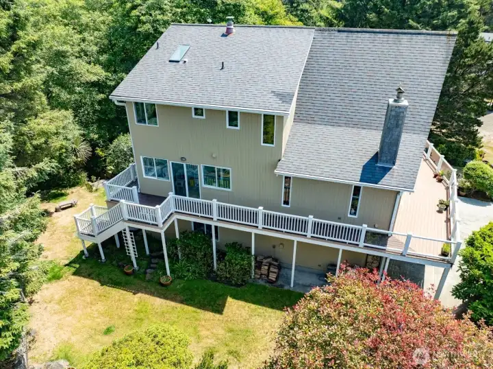 Sitting on a 1/2 acre, wrap around deck affords you wonderful views from all sides of the house. Sitting on a 1/2 acre, wrap around deck affords you wonderful views from all sides of the house.