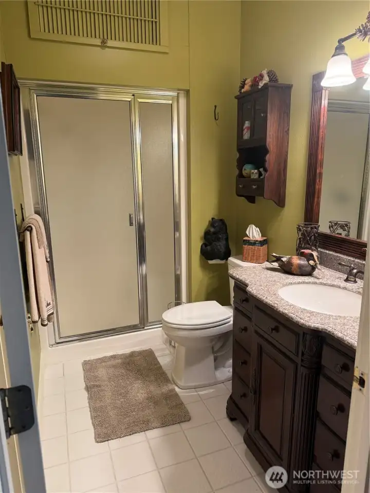 3/4 bath accessible from office/bedroom and family room.