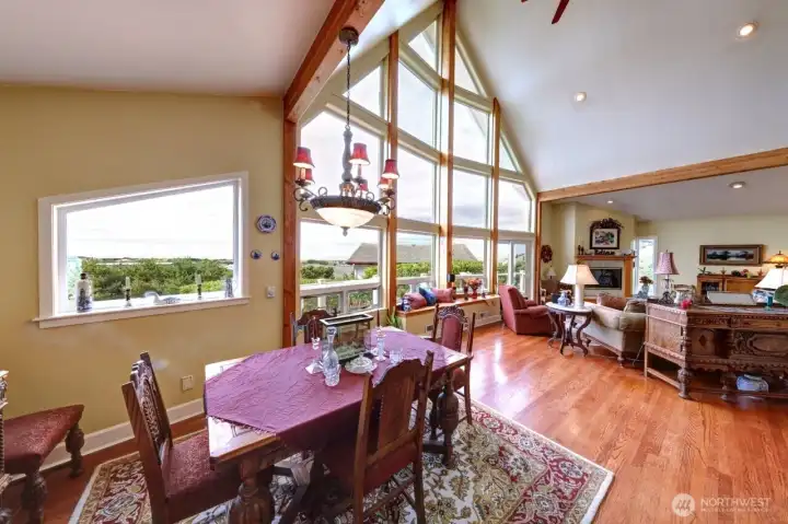 Dining with views of the Ocean as seen in the living room area as well.