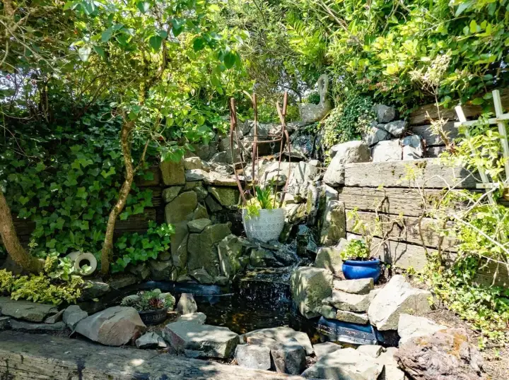 Closer look at the waterfall with four pools.