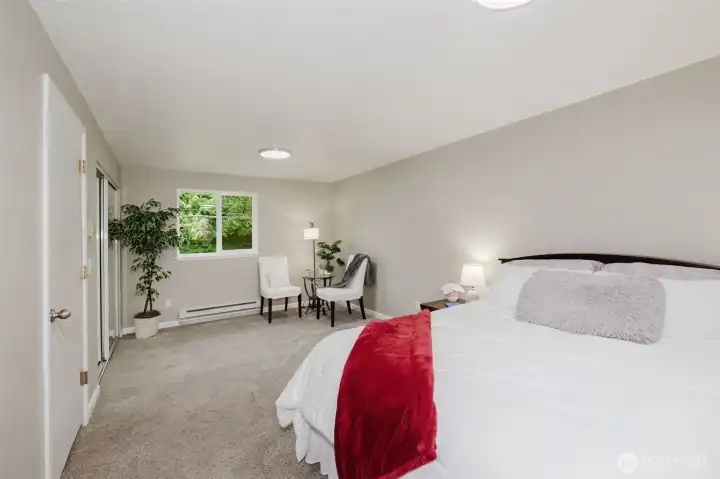 Large primary bedroom with sitting area