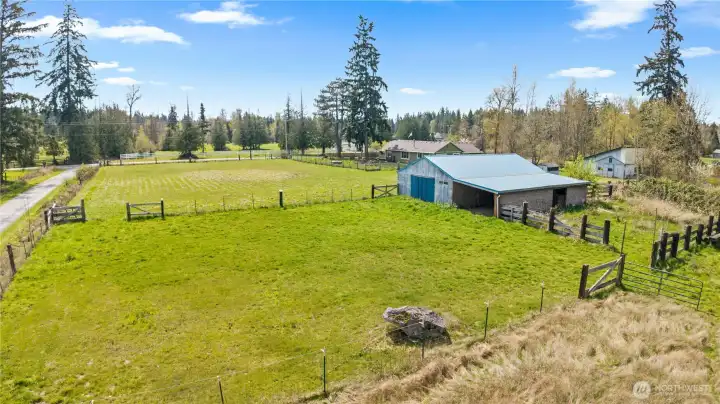 Wide open pasture space with excellent sun exposure, offering prime potential for grazing animals, gardening, or agricultural use.