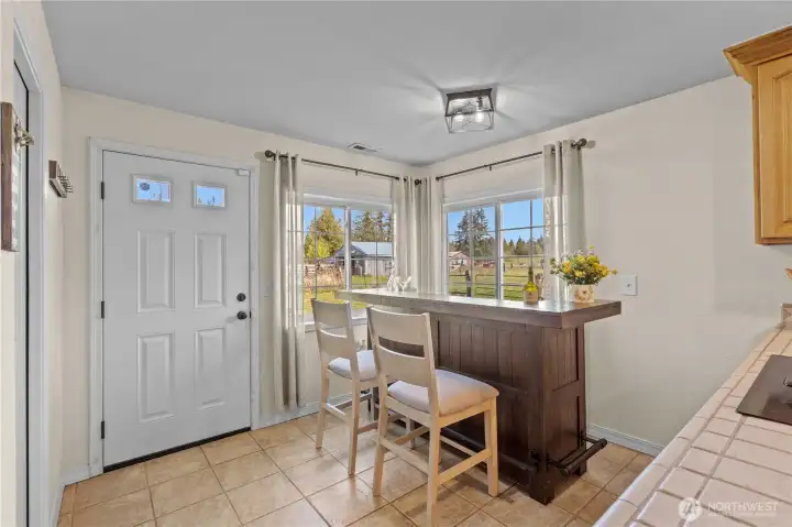 Bright and welcoming entryway with practical layout, offering a smooth transition into the main living spaces.