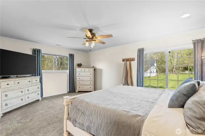 Primary bedroom retreat offering generous space, natural light, and a relaxing atmosphere for unwinding.