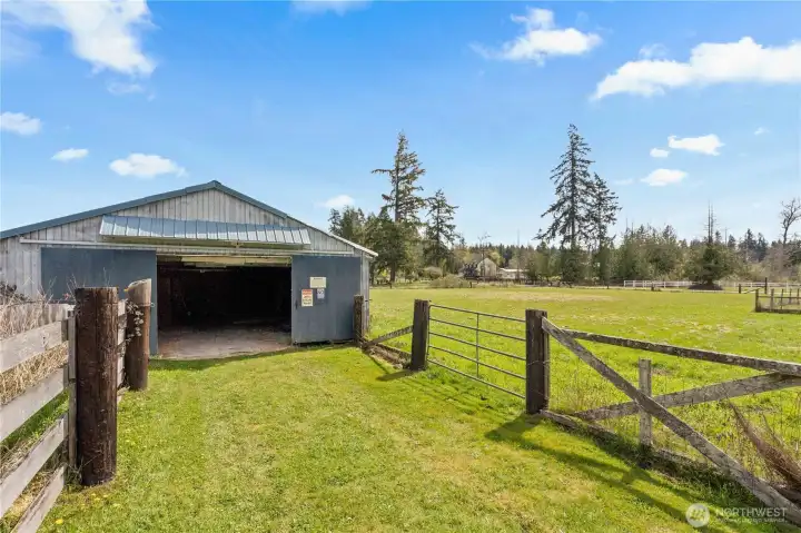 Barn and gated access with dedicated utility entrance—perfect for trailers, equipment, and easy property access.
