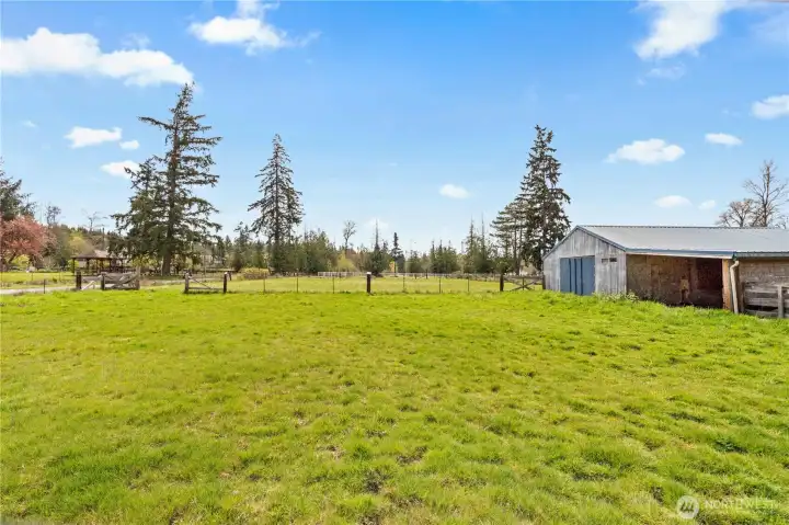 Wide pasture views offering privacy, open space, and excellent potential for animals or outdoor activities.