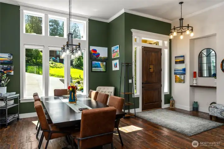 Custom millwork crown molding in the open dining room to allow for oversized dining table with plenty of space. Custom millwork crown molding in the open dining room to allow for oversized dining table with plenty of space.