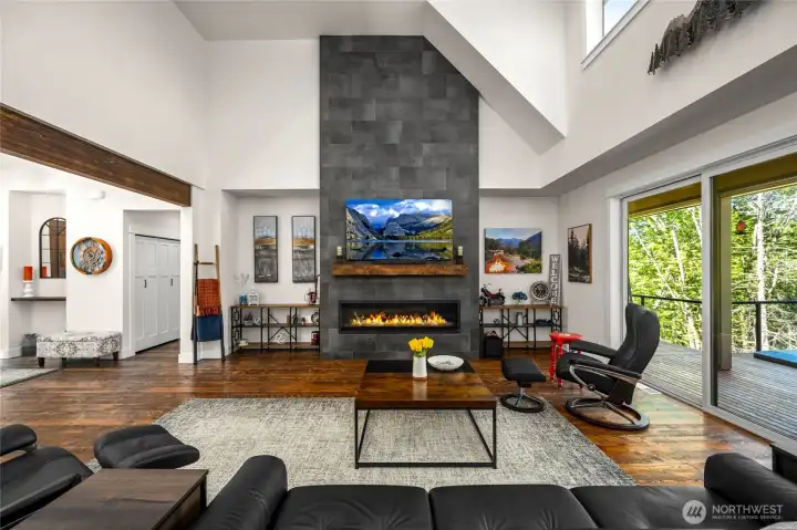 17' tall great room with XL 6'4" long gas fireplace and full height porcelain tile fireplace.