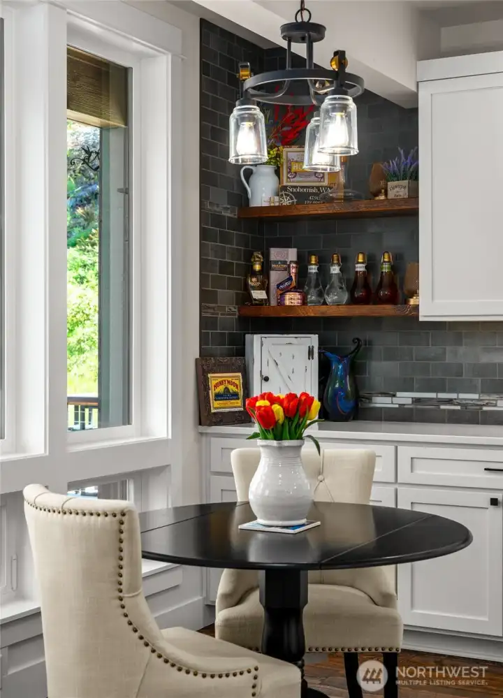 Custom finishes throughout including floating shelves that match the custom hardwood floors.