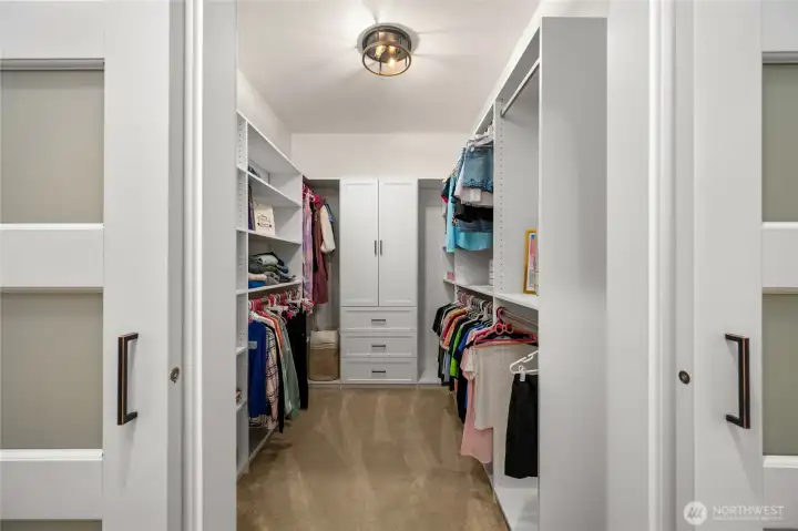 Both additional basement suites offer custom closet systems with barn doors.