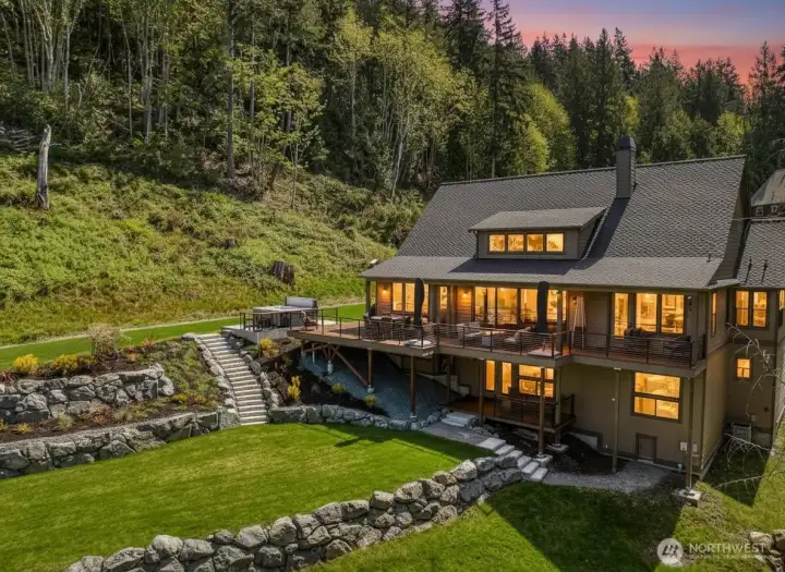 Backyard hardscape stairs and landscaping creeate a wow factor to enjoy.
