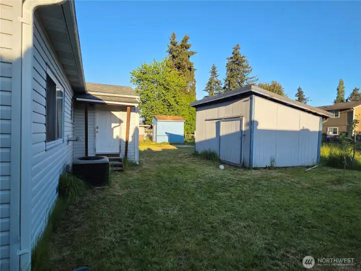 Back yard; utility room door; shed