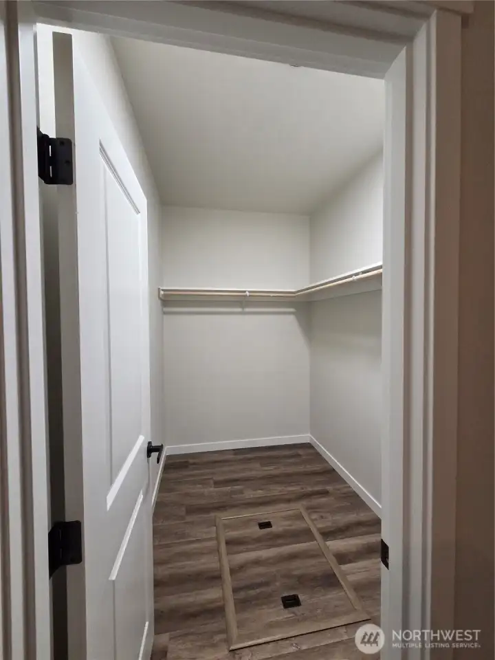 Primary walk-in closet Primary walk-in closet