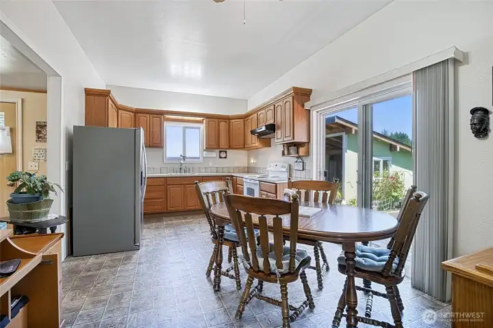 Glass Door off Kitchen to Backyard Glass Door off Kitchen to Backyard