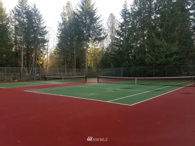 Double tennis courts outside clubhouse