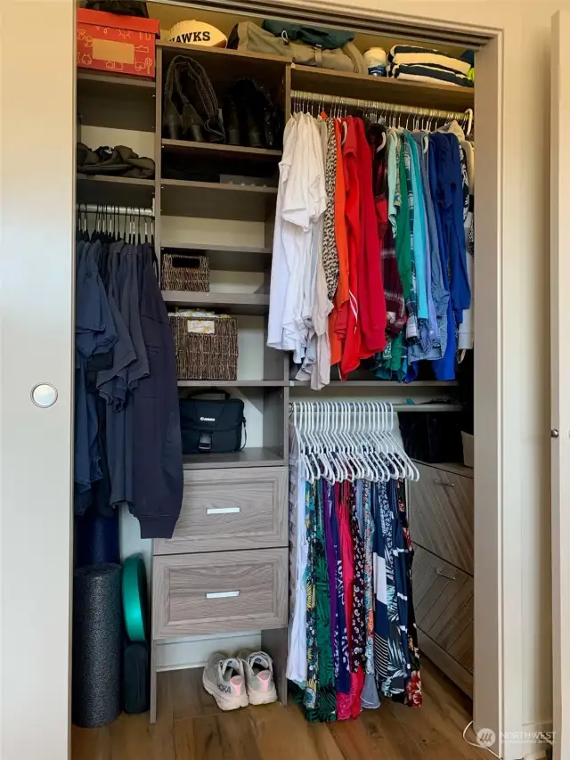 The custom closet organizing system expands your wardrobe storage in multiple ways.