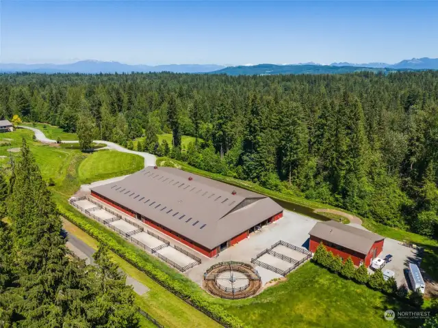 View of Arena facility with Eurociser, storage barn and upstairs apartment.